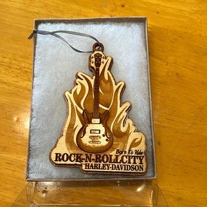 Custom guitar with flames ornament. Rock N Roll City